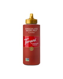 Bottle of Torani Puremade Chocolate Hazelnut Sauce with a golden flip-top cap