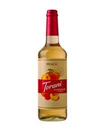 Torani Puremade Peach Syrup in a glass bottle with ripe peach illustrations