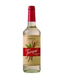 Torani Puremade Vanilla Syrup in a glass bottle with vanilla bean and green leaf illustrations