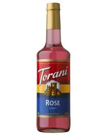 Torani Rose Syrup in a pink-tinted glass bottle with castle-themed label design