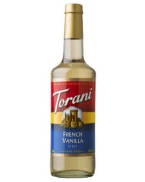 Torani French Vanilla Syrup in a clear glass bottle with light syrup and elegant label