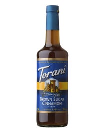 Torani Sugar Free Brown Sugar Cinnamon Syrup in a 750ml bottle with golden syrup and blue label featuring cinnamon imagery