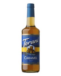 Torani Sugar Free Caramel Syrup in a glass bottle with golden syrup and bold blue label