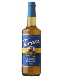 Torani Sugar Free Salted Caramel Syrup in a glass bottle with golden syrup and bold blue label