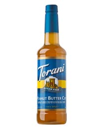Torani Sugar Free Peanut Butter Cup Syrup in a rich amber bottle with blue label and candy cup illustration